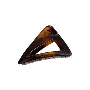 Large amber tortoise shell triangle claw clip in minimalist geometric hollow design