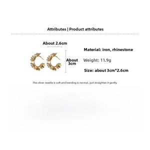 Detailed specs showing gold flower earrings with crystals, weight 11.9g and 3cm size