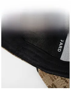 Detail of moisture-wicking sweatband and luxury monogram embroidery inside the baseball cap