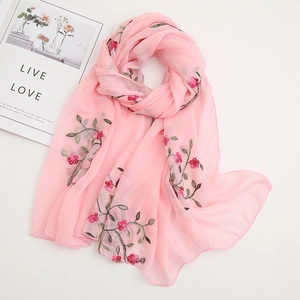 Pink chiffon sun protection beach scarf featuring elegant floral embroidery and lightweight fabric