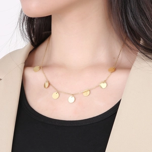 Minimalist gold stainless steel necklace featuring multiple round disk pendants on a fine chain