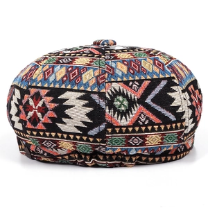 Detailed view of colorful jacquard patterns on vintage bohemian style beret hat