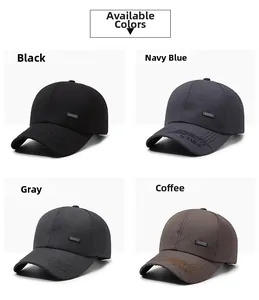Detail view of baseball caps in black, navy, grey, and brown with mountain embroidery