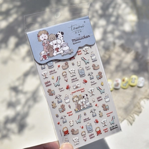 Tomoni embossed nail art stickers featuring cute cartoon dogs and girl illustration