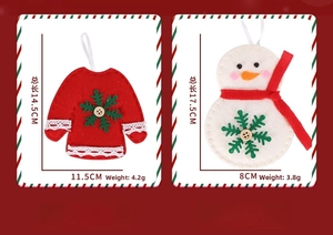 Detail of felt Christmas sweater and snowman ornaments with wood buttons and lace trim