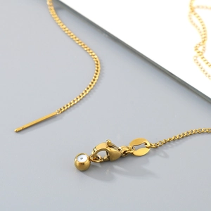 Adjustable 18k gold plated thin box chain necklace featuring a blue evil eye bead detail