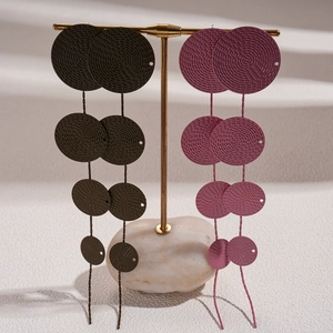 Chic multi-layered geometric woven disc drop earrings in brown and purple with gold hooks