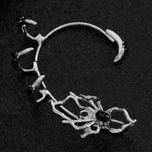 Gothic silver spider ear cuff with black gemstones for non-pierced ears in dark style