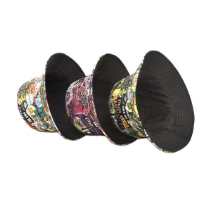 Detail of graffiti print bucket hat with wide brim and black cotton lining interior