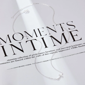 Macro detail of a minimalist 925 sterling silver cross pendant with a high-polished finish