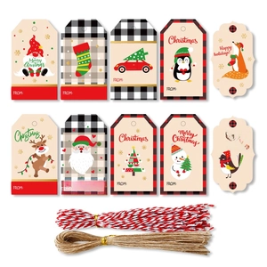 Various Christmas kraft paper gift tags with festive patterns and colorful hanging strings