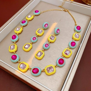 Macro shot of vintage luxury jewelry set with gold metal and colorful gemstones in a box