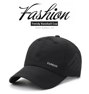 Close-up of black breathable baseball cap with white Fashion embroidery and geometric pattern