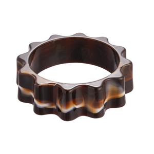 Modern tortoiseshell acrylic bangle with wavy scalloped edges and amber resin swirl pattern