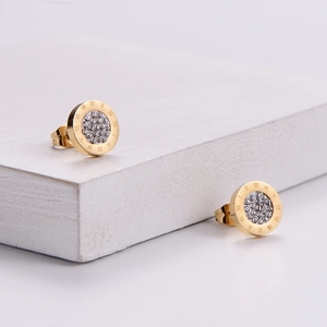 Gold stainless steel round stud earrings with roman numerals and crystal inlay