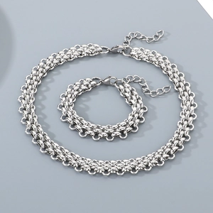 Hip-hop stainless steel jewelry set featuring a braided necklace and matching bracelet