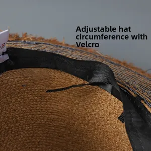 Detail view of denim straw hat interior with adjustable drawstring and sweatband