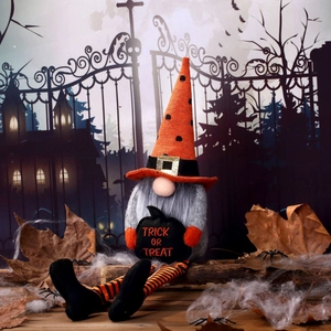 Halloween long-legged gnome plush with orange pumpkin hat and Trick or Treat sign