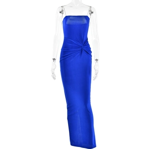 Detail of the blue dress featuring a waist knot design and elegant rhinestone chain straps