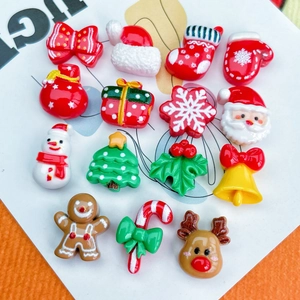 Detailed view of 15 mini Christmas resin nail charms featuring festive holiday designs