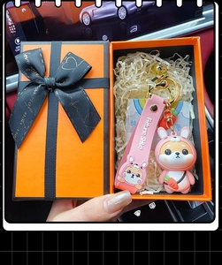 Cute pink rabbit-outfit Shiba Inu keychain gift set in a luxury orange gift box