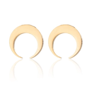 Detailed view of gold crescent moon earrings with smooth metallic finish on white background