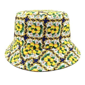 Detail of bohemian bucket hat showing lemon and daisy prints on thick cotton canvas