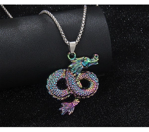 Macro detail of a colorful dragon totem pendant on a silver box chain necklace
