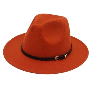 Detail of orange wool fedora hat featuring a black leather belt with golden buckle