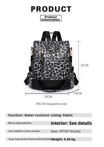 Detailed view of leopard print backpack with 35x33x14cm size and functional features