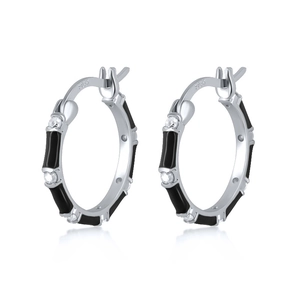Detail of S925 silver bamboo hoop earrings with black enamel and white zircon stones
