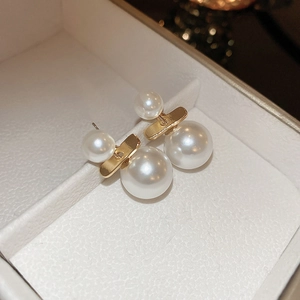Chic two-way geometric pearl stud earrings with gold rectangular link in a jewelry box