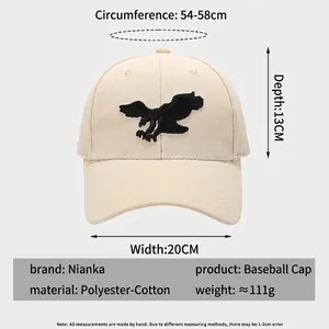 Casquette de baseball beige avec broderie aigle noir montrant dimensions 54-58cm et style