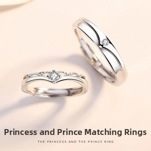 Detailed close-up of S925 silver adjustable couple rings with crown and sleek band design