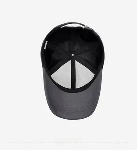 Detailed interior of dark grey cotton baseball cap showing lining and inner structure