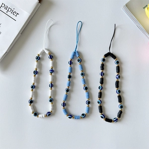 Handmade beaded phone straps with evil eye beads and colorful clay discs in three styles