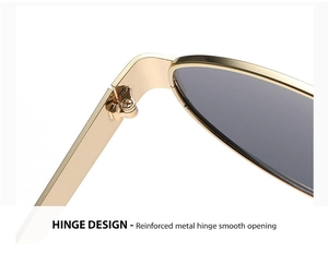 Detail shot of a reinforced gold metal hinge on premium oval sunglasses
