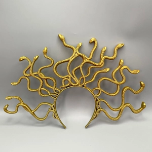 Detailed view of a golden Medusa snake headpiece for Halloween cosplay costume