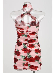 Detail of pink rose print halter neck dress with ruched fabric and back zipper closure