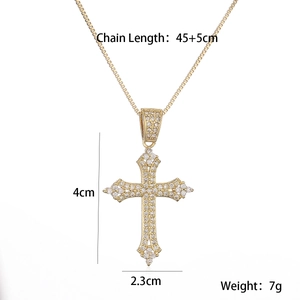 Detailed view of 18K gold cross necklace dimensions showing chain length and weight