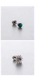 Macro detail of opal ball and blue floral surgical steel screw back stud earrings
