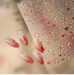 Detailed 5D relief nail stickers featuring red hearts and fireworks for festive manicures