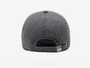 Detail view of the gray textured baseball cap showing the adjustable metal buckle on back