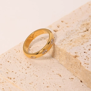 18k gold plated stainless steel ring featuring three marquise cut white zircons