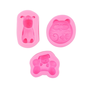 Pink silicone mold set for DIY baking with cat, goldfish, and cartoon dog patterns