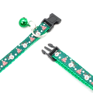 Green Christmas dog collar with reindeer prints and a small green bell accessory