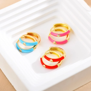 Fashionable colorful enamel hoop earrings with diamonds in blue, pink, and red