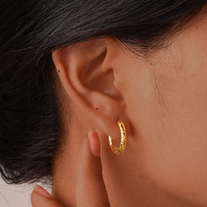 Chic gold stainless steel hoop earrings for women with textured geometric engraving