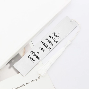 Sleek stainless steel bookmark with white tassel and humorous laser-engraved quote