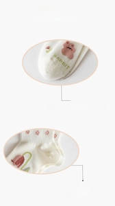 Detail of seamless toe and reinforced heel on white cotton socks with pink bear embroidery